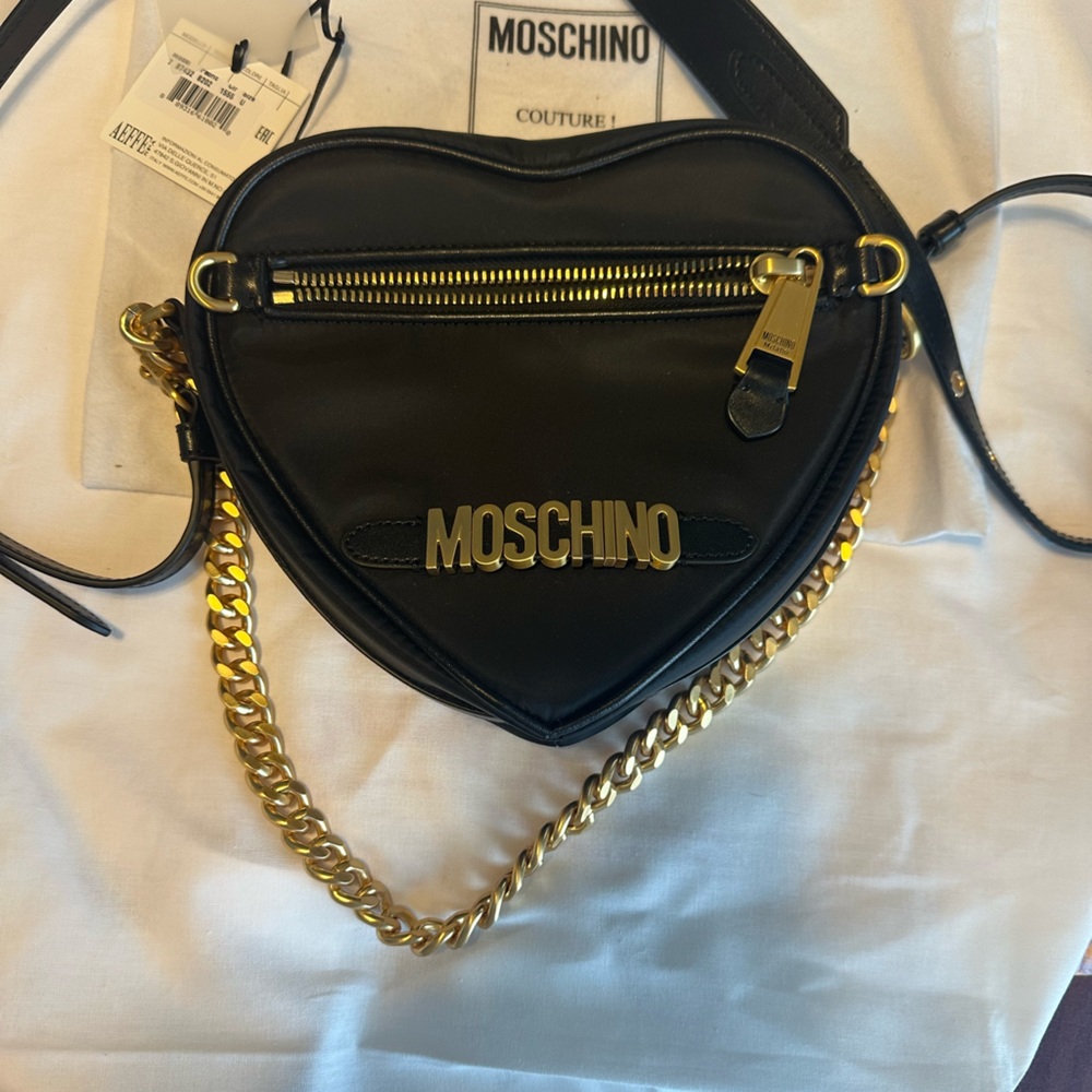 Moschino nylon heart bag. Used a few times. Excellent condition.